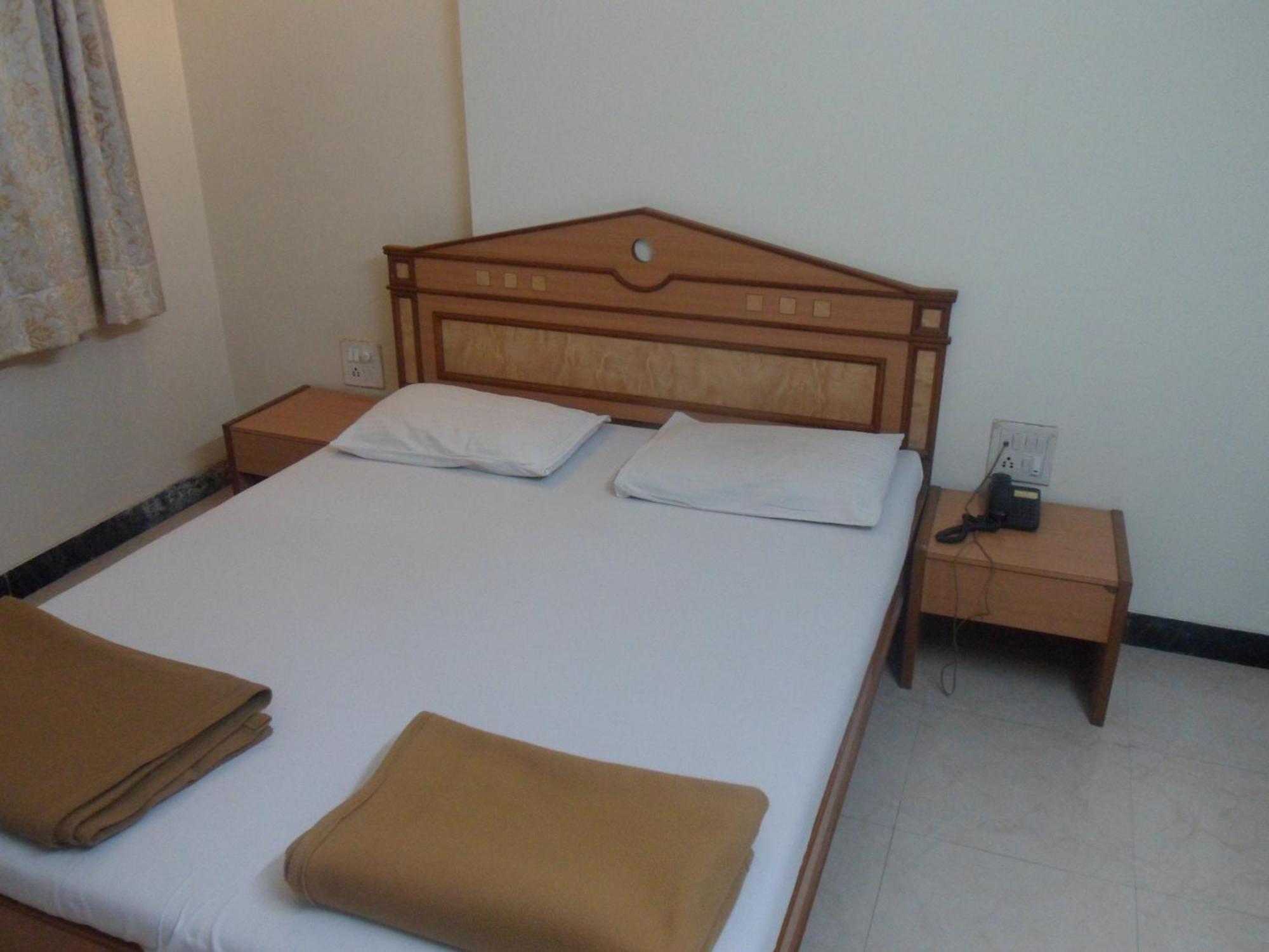 Hotel Pooja International Nashik Habitación foto