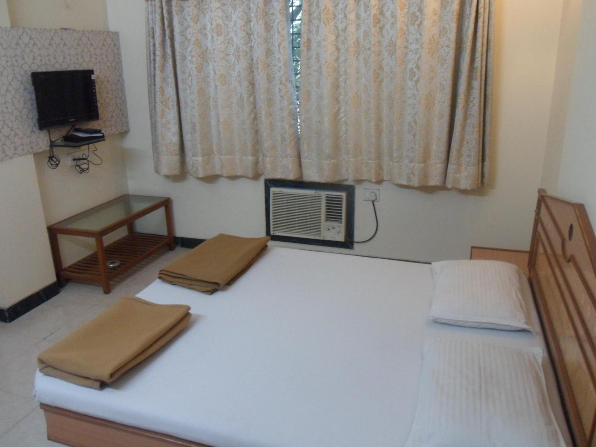 Hotel Pooja International Nashik Habitación foto
